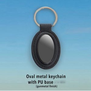 101-J69*Oval metal keychain with PU base (gunmetal finish)